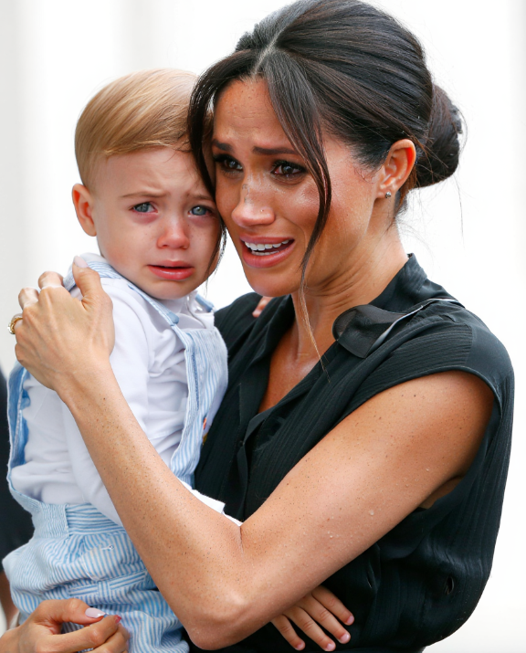 15 MINUTES AGO! Meghan Markle, holding her son Archie, delivered IMPORTANT NEWS from America. The entire Palace was left in shock and sorrow as her trembling voice cried out: ‘My Harry and my Lilibet are being…’”